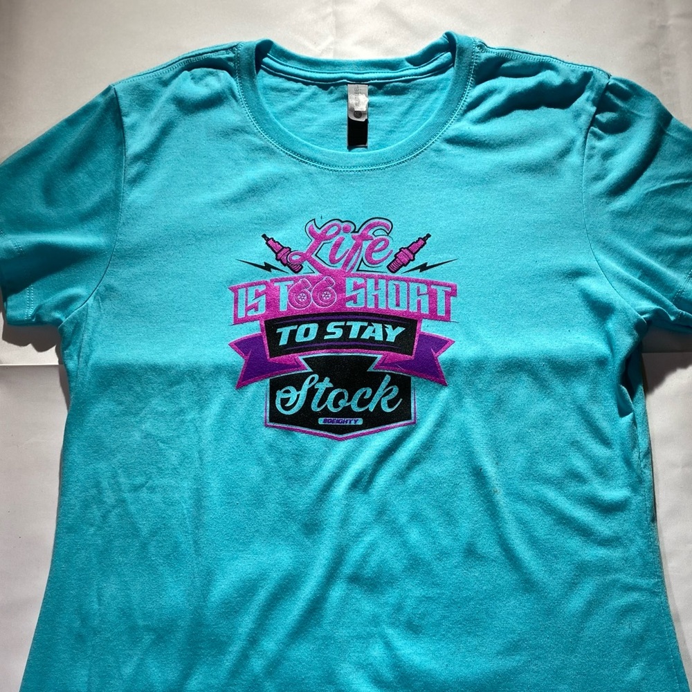 Blue next level life is too short to stay stock t-shirt. Size large